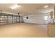 Spacious two car garage with white walls and an automatic door at 4589 Alder Dr, Port Orange, FL 32127