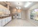 Open kitchen with modern appliances and lots of natural light at 4589 Alder Dr, Port Orange, FL 32127