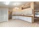 Spacious kitchen boasts ample counter space and plenty of storage at 4589 Alder Dr, Port Orange, FL 32127