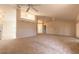 Spacious living room with vaulted ceilings and open access to the kitchen at 4589 Alder Dr, Port Orange, FL 32127