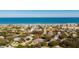 Scenic aerial view of a beautiful home near the ocean featuring a swimming pool at 4745 Dixie Dr, Ponce Inlet, FL 32127