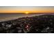 Breathtaking aerial view of the homes and the ocean view at sunset at 4745 Dixie Dr, Ponce Inlet, FL 32127