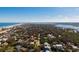 Stunning aerial view of the neighborhood showcasing the community and beach access at 4745 Dixie Dr, Ponce Inlet, FL 32127