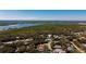 Beautiful aerial view of the homes, the harbor, and the stunning nature preserve at 4745 Dixie Dr, Ponce Inlet, FL 32127