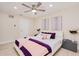 Charming bedroom features a modern ceiling fan, neutral walls, and stylish decor at 4745 Dixie Dr, Ponce Inlet, FL 32127