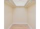 Walk-in closet with ample space and wood-look tile floor at 4745 Dixie Dr, Ponce Inlet, FL 32127