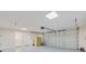 Spacious garage with room for parking and storage and entry to additional room at 4745 Dixie Dr, Ponce Inlet, FL 32127