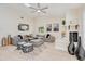 Comfortable living room with large couch, stylish decor, and white brick fireplace at 4745 Dixie Dr, Ponce Inlet, FL 32127