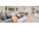 Inviting living room featuring comfortable seating, large windows, and modern décor for a cozy atmosphere at 4745 Dixie Dr, Ponce Inlet, FL 32127