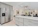 Open concept kitchen and living space with stainless steel appliances and seamless flow at 4745 Dixie Dr, Ponce Inlet, FL 32127