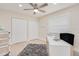 Versatile office space with neutral walls, ceiling fan, and modern decor at 4745 Dixie Dr, Ponce Inlet, FL 32127