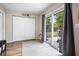 Bright room with glass doors to the patio and backyard, perfect for indoor-outdoor living at 4836 Ne 26Th Ter, Ocala, FL 34479
