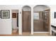 This bathroom showcases a walk-in shower with arched entry, tiled surround, and a glass door at 4901 Lake Milly Dr, Orlando, FL 32839