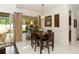 Cozy dining area bathed in natural light, providing a pleasant space for meals at 4901 Lake Milly Dr, Orlando, FL 32839