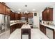 Stylish kitchen with stainless steel appliances, ample cabinet space, and a functional center island at 4901 Lake Milly Dr, Orlando, FL 32839