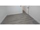 Bedroom with wood-look floors and freshly painted at 508 N Keech St, Daytona Beach, FL 32114