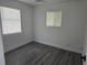 Bedroom with new vinyl floors and natural light at 508 N Keech St, Daytona Beach, FL 32114