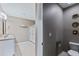 Open bathroom with double sinks and a walk-in shower at 5298 Bear Corn Run, Port Orange, FL 32128