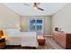 Bedroom with wood floors and bright view at 5298 Bear Corn Run, Port Orange, FL 32128