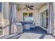 Comfortable outdoor patio featuring a cozy seating area, perfect for relaxing and entertaining at 5298 Bear Corn Run, Port Orange, FL 32128