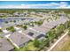 Overhead shot featuring a screened-in pool, solar panels, and the beautiful community at 669 E Victoria Trails Blvd, Deland, FL 32724