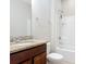 Bathroom with granite countertop vanity and tub-shower combination at 669 E Victoria Trails Blvd, Deland, FL 32724