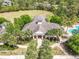 Overhead shot of the community center boasting beautiful architecture and lush green landscaping at 669 E Victoria Trails Blvd, Deland, FL 32724