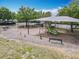 Community playground with swings, slides, and shaded picnic area for outdoor enjoyment at 669 E Victoria Trails Blvd, Deland, FL 32724