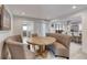 Cozy dining area with cushioned bench seating, hardwood floors and access to other rooms at 787 Ocean Shore Blvd, Ormond Beach, FL 32176