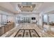 Modern kitchen with an island cooktop and seating, perfect for cooking and casual dining at 787 Ocean Shore Blvd, Ormond Beach, FL 32176