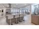 Bright kitchen with stainless appliances, white countertops, and center island with seating at 787 Ocean Shore Blvd, Ormond Beach, FL 32176