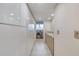 Well-organized laundry room features ample storage and modern appliances at 787 Ocean Shore Blvd, Ormond Beach, FL 32176