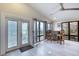 Inviting room with a coastal view, outdoor seating, and comfortable interior, offering a relaxing lifestyle at 787 Ocean Shore Blvd, Ormond Beach, FL 32176