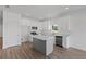 Modern kitchen with stainless appliances, a center island, and bright white cabinets at 810 W 24Th St, Sanford, FL 32771