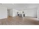 Spacious open-concept featuring stainless steel appliances and a central kitchen island at 810 W 24Th St, Sanford, FL 32771