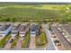 Stunning aerial view of a neighborhood with solar panels, and a brick driveway at 8561 Randal Park Blvd, Orlando, FL 32832