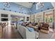 Comfortable clubhouse interior with high ceilings, chandeliers, ample seating and natural light at 8561 Randal Park Blvd, Orlando, FL 32832