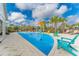Fun splash pad area for to enjoy with colorful play features, palm trees, and lounge chairs at 8561 Randal Park Blvd, Orlando, FL 32832