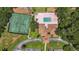 Aerial view of community amenities including a tennis court, pool, and clubhouse at 914 Smokerise Blvd, Port Orange, FL 32127
