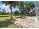 Relax in the backyard on the paved patio and bench overlooking the water at 914 Smokerise Blvd, Port Orange, FL 32127