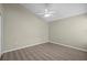 Neutral bedroom with light wood floors and vaulted ceilings at 914 Smokerise Blvd, Port Orange, FL 32127