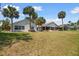 The exteriors of the homes have well-maintained lawns with palm trees at 914 Smokerise Blvd, Port Orange, FL 32127