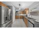 Bright kitchen featuring stainless steel appliances, granite counters and modern cabinetry at 914 Smokerise Blvd, Port Orange, FL 32127