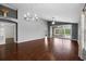 Spacious living room with high ceilings, hardwood floors, and sliding glass doors leading to an outdoor space at 914 Smokerise Blvd, Port Orange, FL 32127