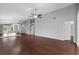 Bright and airy living room with hardwood floors, neutral paint, and multiple entryways for easy flow at 914 Smokerise Blvd, Port Orange, FL 32127