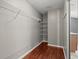 Walk-in closet with hardwood floors and white wire shelving at 914 Smokerise Blvd, Port Orange, FL 32127