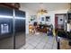 Spacious kitchen equipped with stainless steel refrigerator and ample counter space for all your culinary needs at 950 Windway Cir, Kissimmee, FL 34744