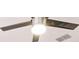 Close up of a modern ceiling fan on a white ceiling, showcasing the fixture's design at 999 Trumbull St, Deltona, FL 32725
