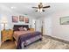 Comfortable bedroom with a plush bed, soft rug, and ample storage at 1560 S Pearl St, Deland, FL 32720