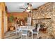 Charming dining room featuring a stone fireplace and stylish decor at 1560 S Pearl St, Deland, FL 32720